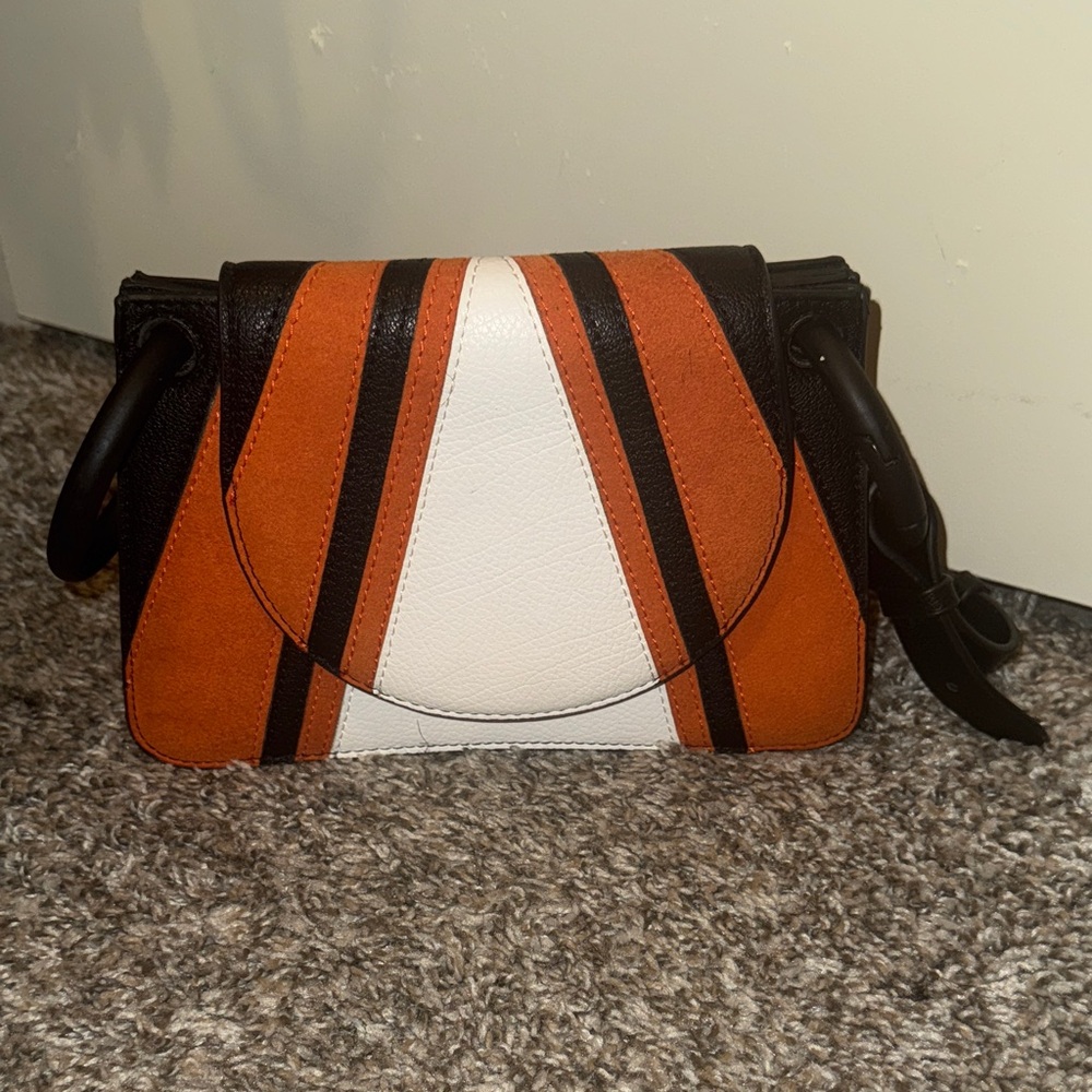 Elegant Black, Orange, and White Clutch